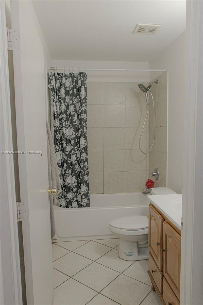14316 Southwest 283rd Street, Unit 14316 Homestead, FL 33033 - Photo 6 of 6 a bathroom with a toilet and a shower