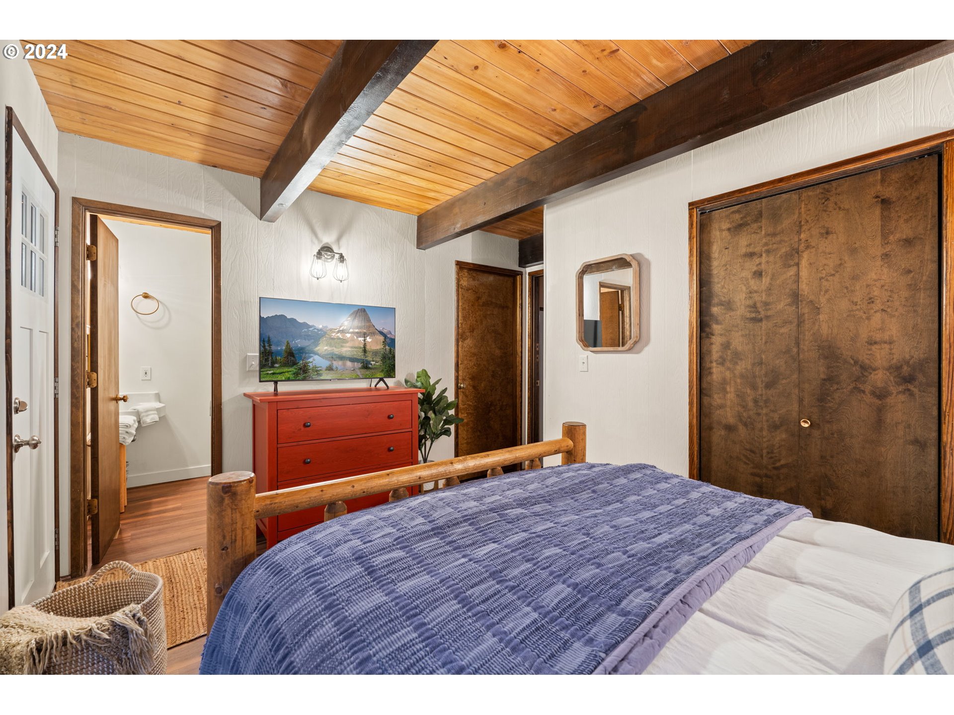88460 Government Camp Loop, Unit 8 Government Camp, OR 97028 - Photo 14 of 38 a bedroom with a bed and a dresser