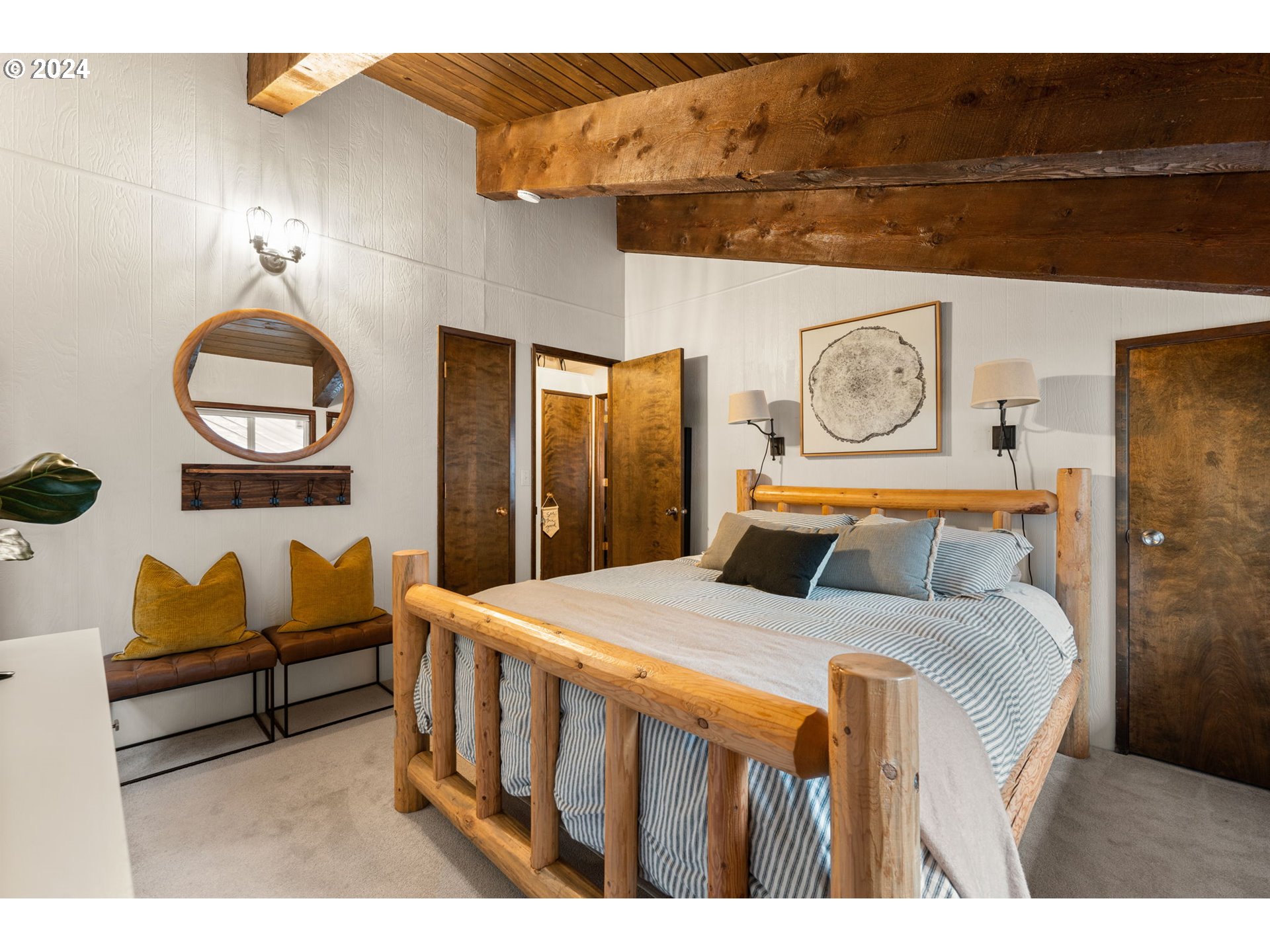 88460 Government Camp Loop, Unit 8 Government Camp, OR 97028 - Photo 18 of 38 a bedroom with a bed a painting and lamp