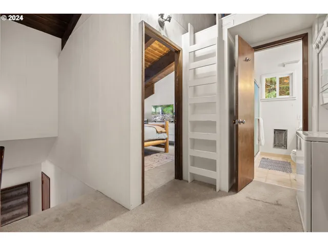 a bathroom with a shower and a sink