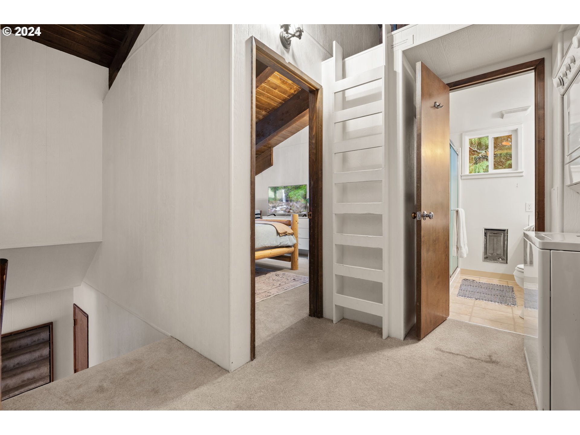 88460 Government Camp Loop, Unit 8 Government Camp, OR 97028 - Photo 23 of 38 a room with closet and a wooden floor