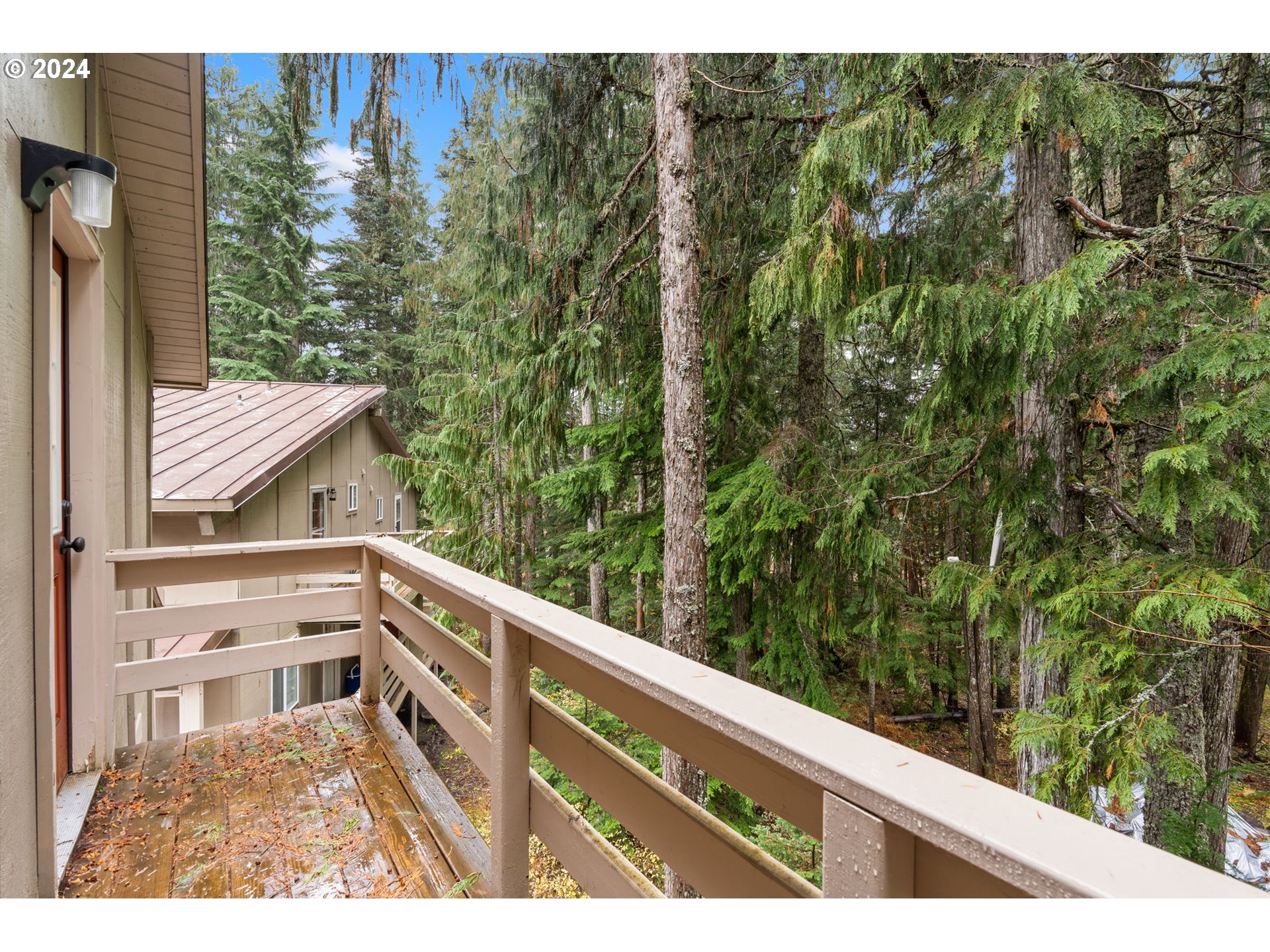88460 Government Camp Loop, Unit 8 Government Camp, OR 97028 - Photo 25 of 38 a view of balcony with wooden floor