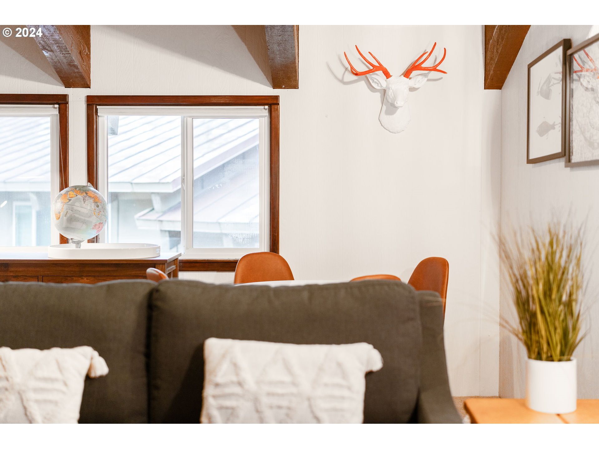 88460 Government Camp Loop, Unit 8 Government Camp, OR 97028 - Photo 26 of 38 a bedroom with a bed and a large window