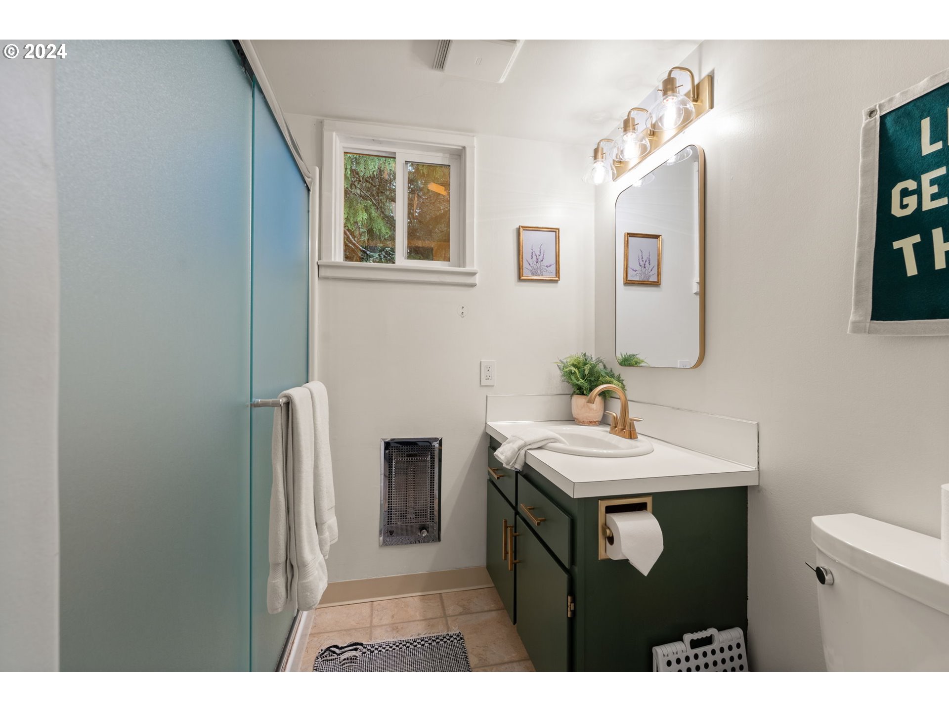 88460 Government Camp Loop, Unit 8 Government Camp, OR 97028 - Photo 29 of 38 a bathroom with a sink a mirror and a toilet