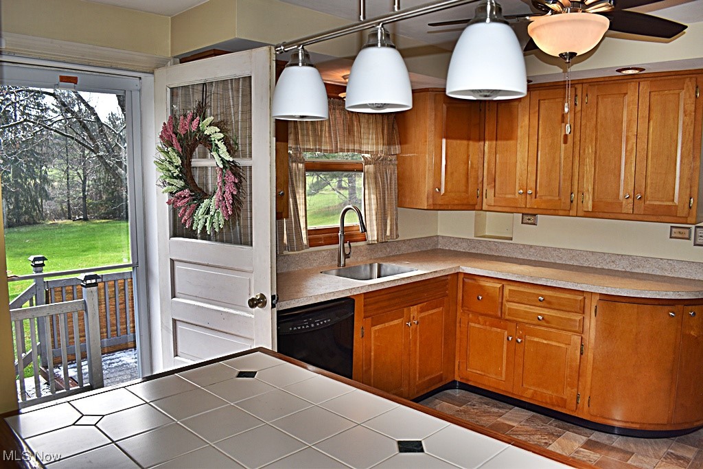 17600 Egbert Road Bedford, OH 44146 - Photo 22 of 49 Kitchen with back door that leads to wonderful composite deck with retractable awning...