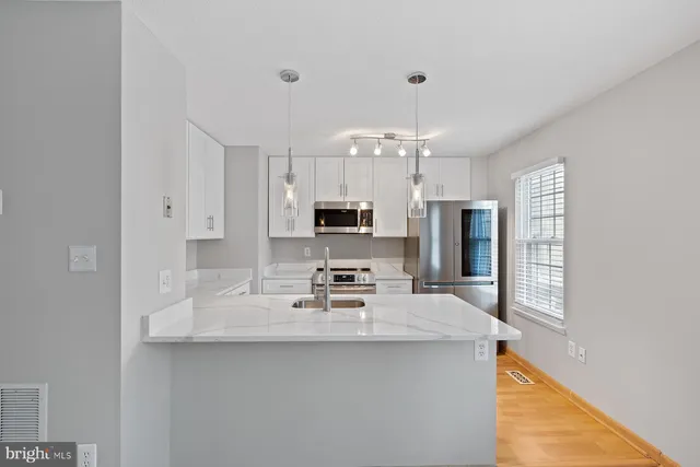 a view of kitchen with breakfast area