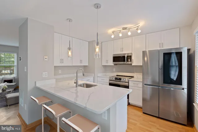 a view of kitchen with breakfast area