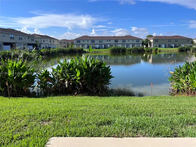 a view of a lake with a city