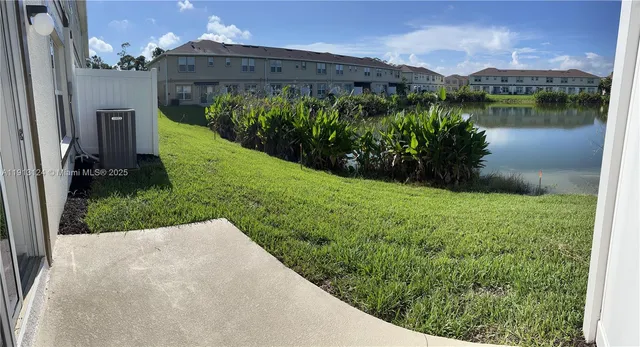 a view of a garden with a lake
