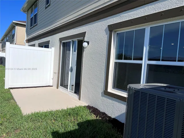 a view of a house with a large window