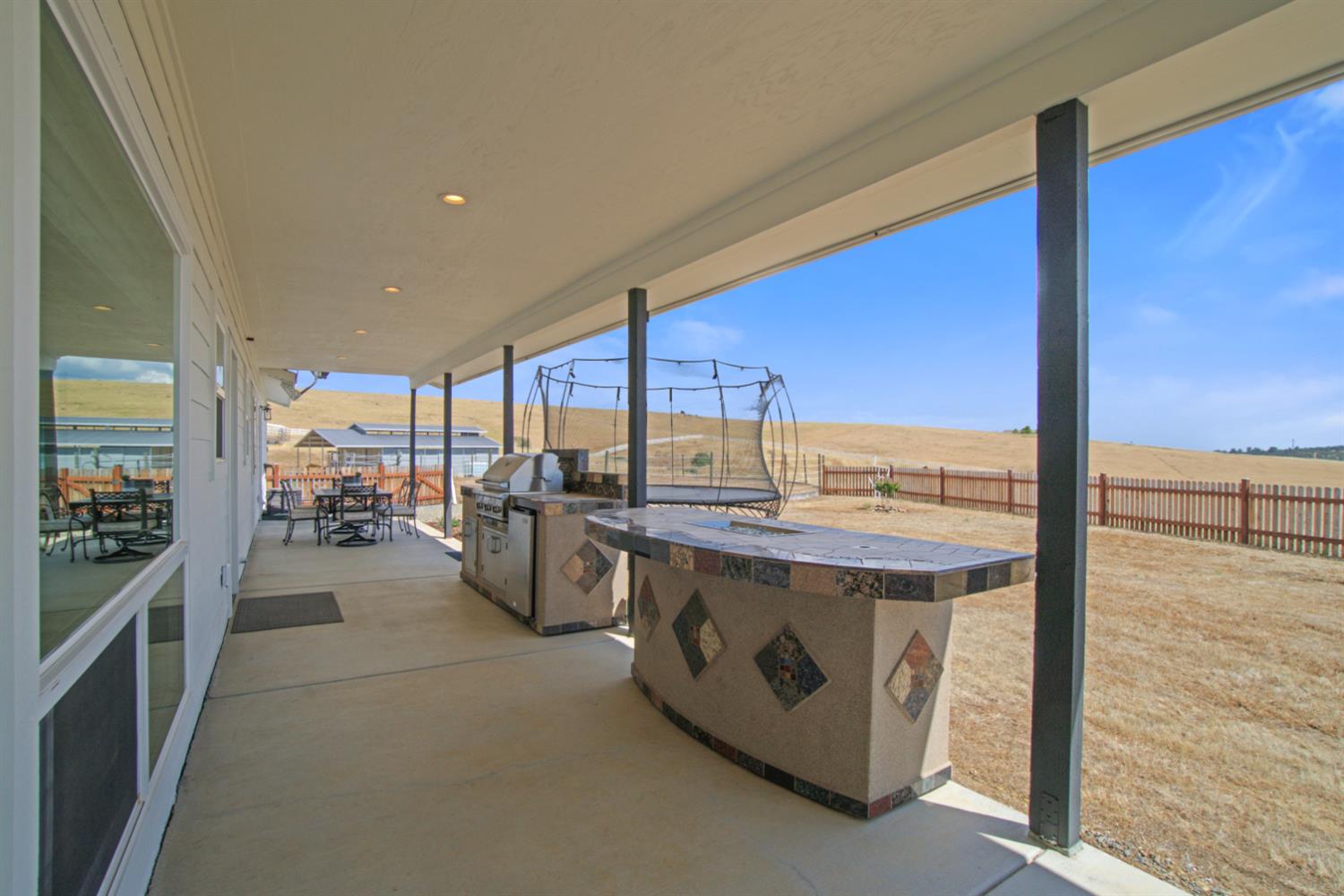 7991 South Shingle Road Shingle Springs, CA 95682 - Photo 44 of 58 a view of a kitchen with a large window