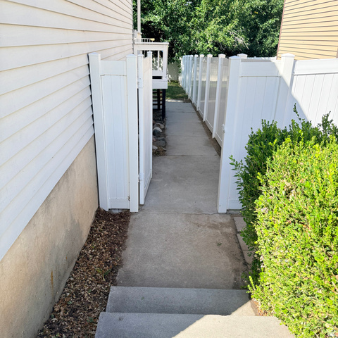 10240 Locksley Road Sandy, UT 84092 - Photo 22 of 27 Pathway to backyard from side of garage.