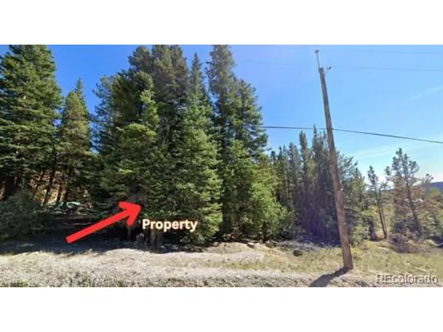 a bird view of a house with a yard