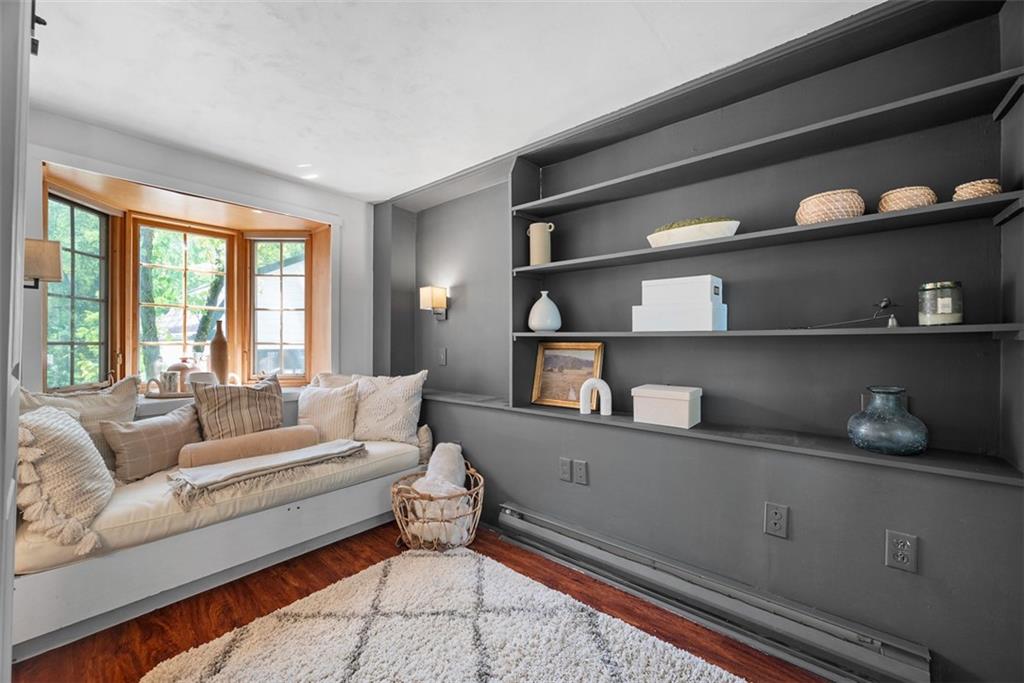853 West Ingomar Road Pittsburgh, PA 15237 - Photo 20 of 50 The main level office is a real gem. Check out this character with the accent wall with shelving, and the built-in bay window seat.