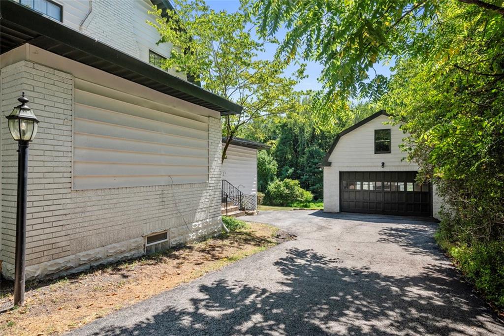 853 West Ingomar Road Pittsburgh, PA 15237 - Photo 39 of 50 Large two car detached garage has even more storage above.