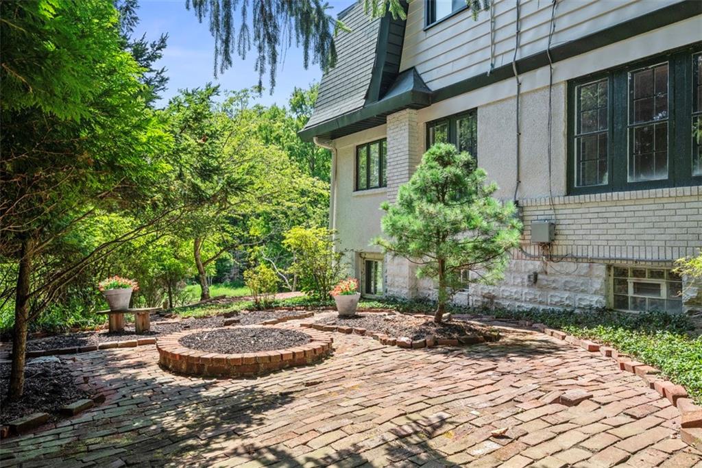 853 West Ingomar Road Pittsburgh, PA 15237 - Photo 42 of 50 The quaint side patio has space for a firepit or flower garden with cobblestone bricks.