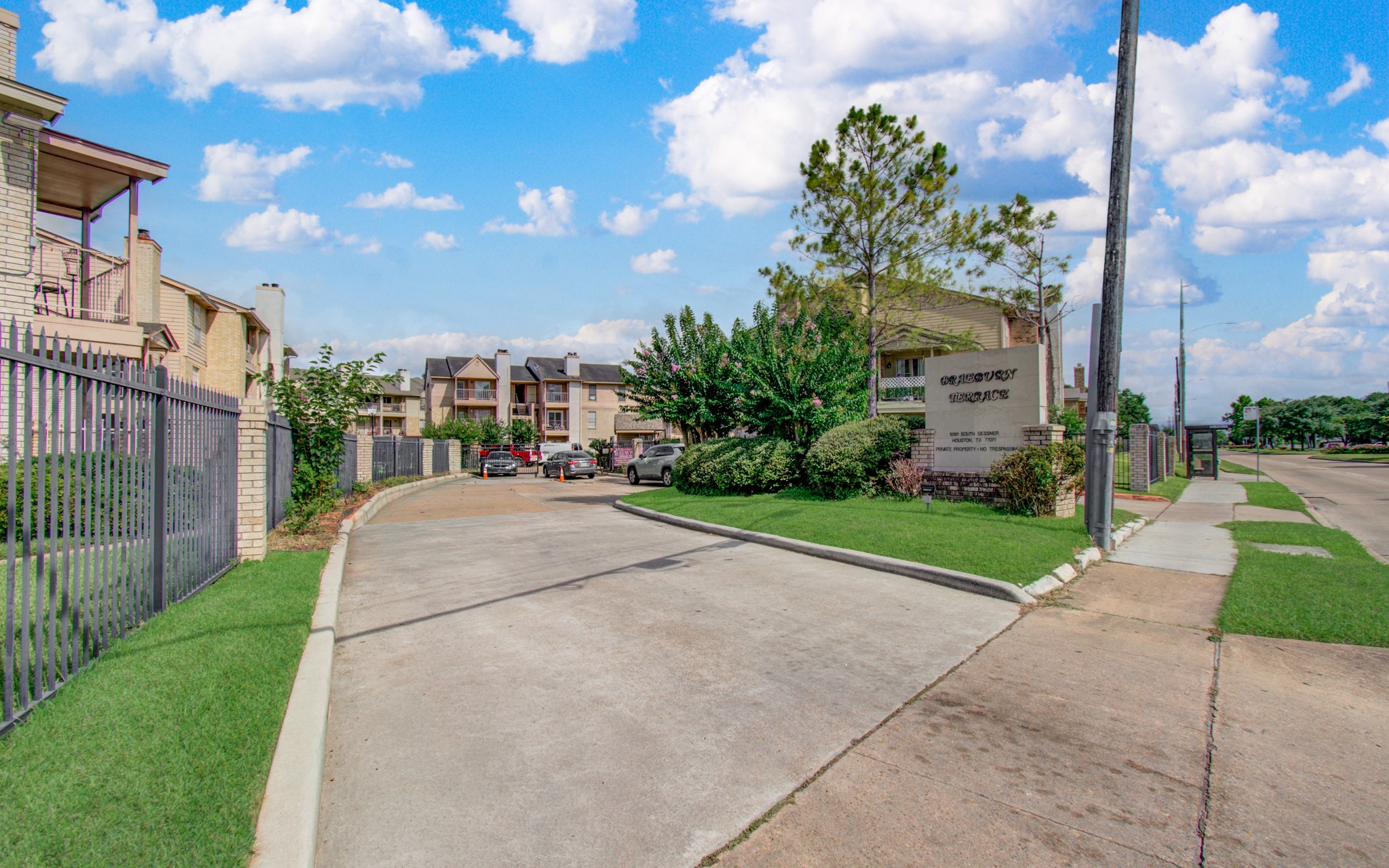 10101 South Gessner Road, Unit 405 Houston, TX 77071 - Photo 27 of 27 a view of a street with a building in the background