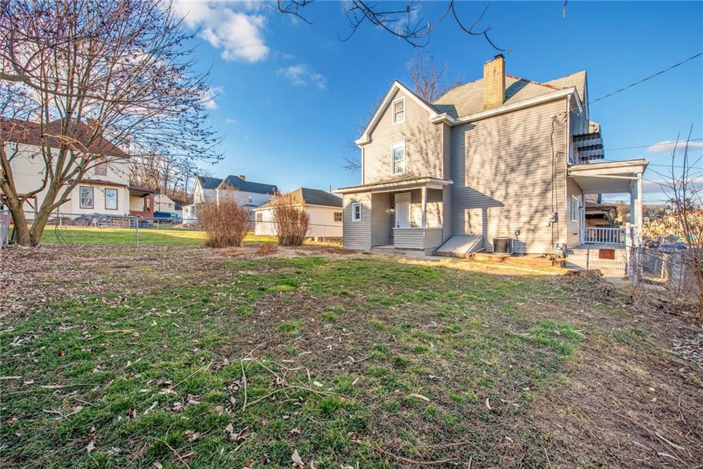 1222 Valley Street McKees Rocks, PA 15136 - Photo 2 of 13 a view of a house with a yard