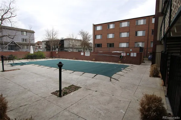 a street view with tall buildings and a street