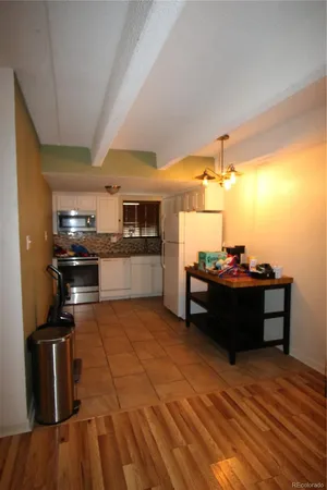 a kitchen with a sink and an oven