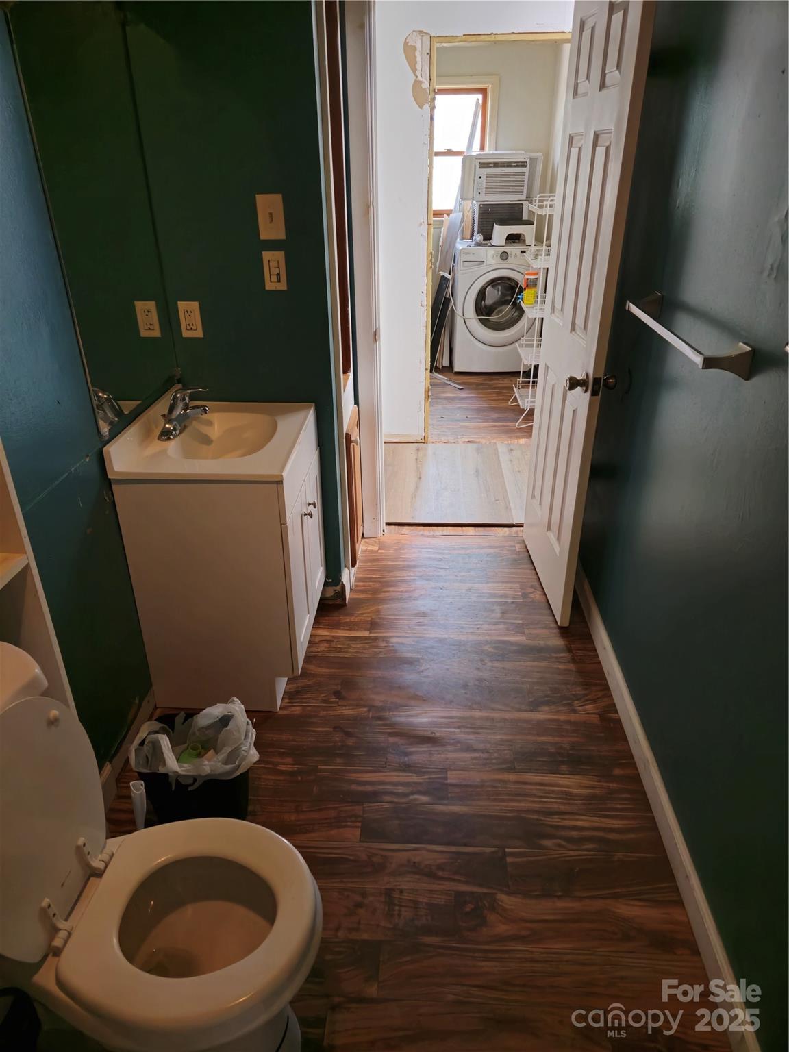 2169 Stone Chimney Road Southwest Supply, NC 28462 - Photo 22 of 27 a bathroom with a toilet and a sink