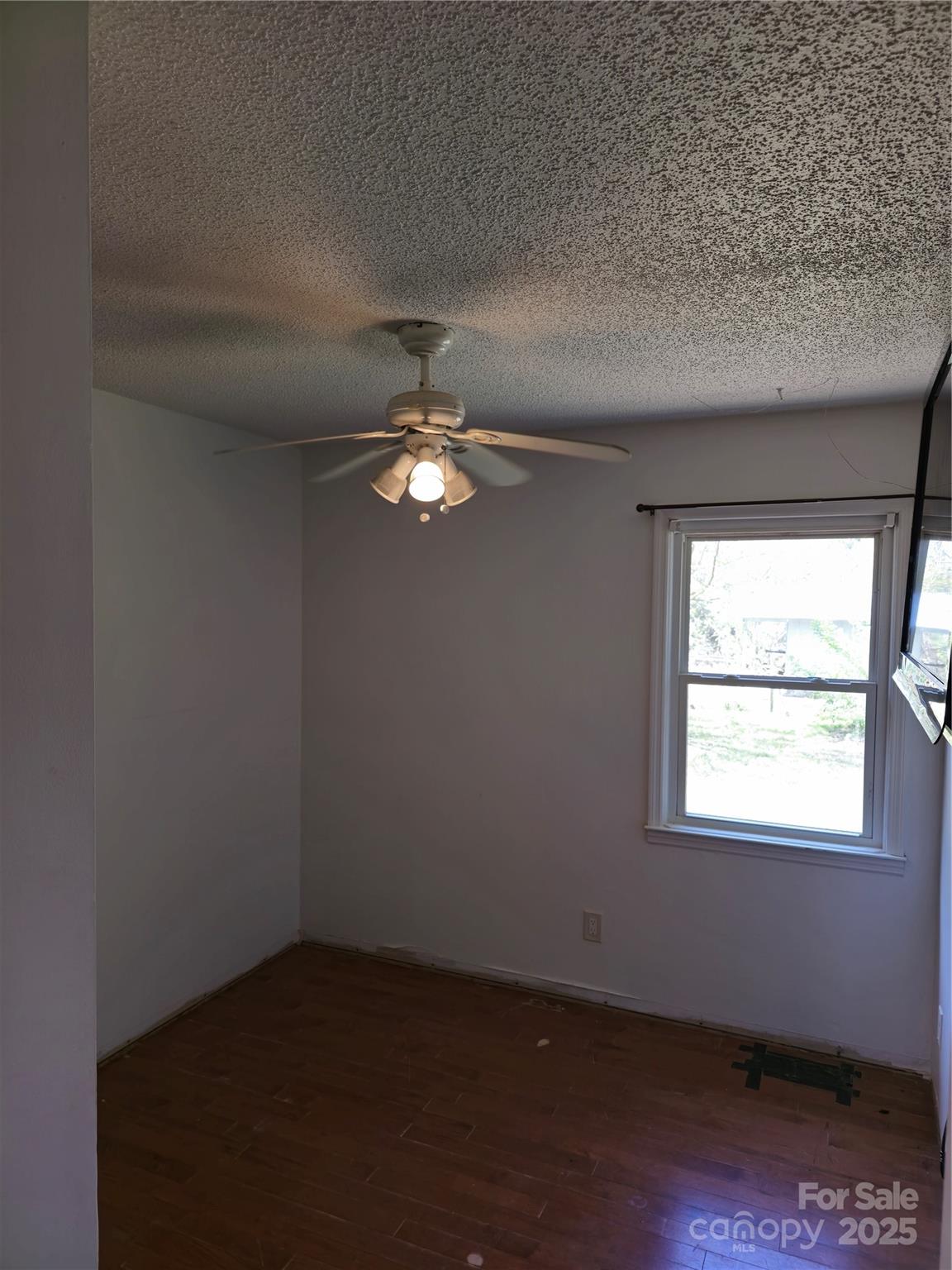 2169 Stone Chimney Road Southwest Supply, NC 28462 - Photo 27 of 27 an empty room with a window