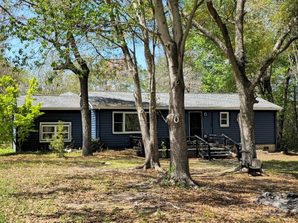 2169 Stone Chimney Road Southwest Supply, NC 28462 - Photo 4 of 27 a view of a house with backyard