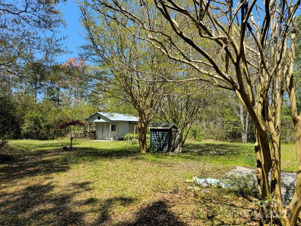 2169 Stone Chimney Road Southwest Supply, NC 28462 - Photo 10 of 27 a view of a house with a yard