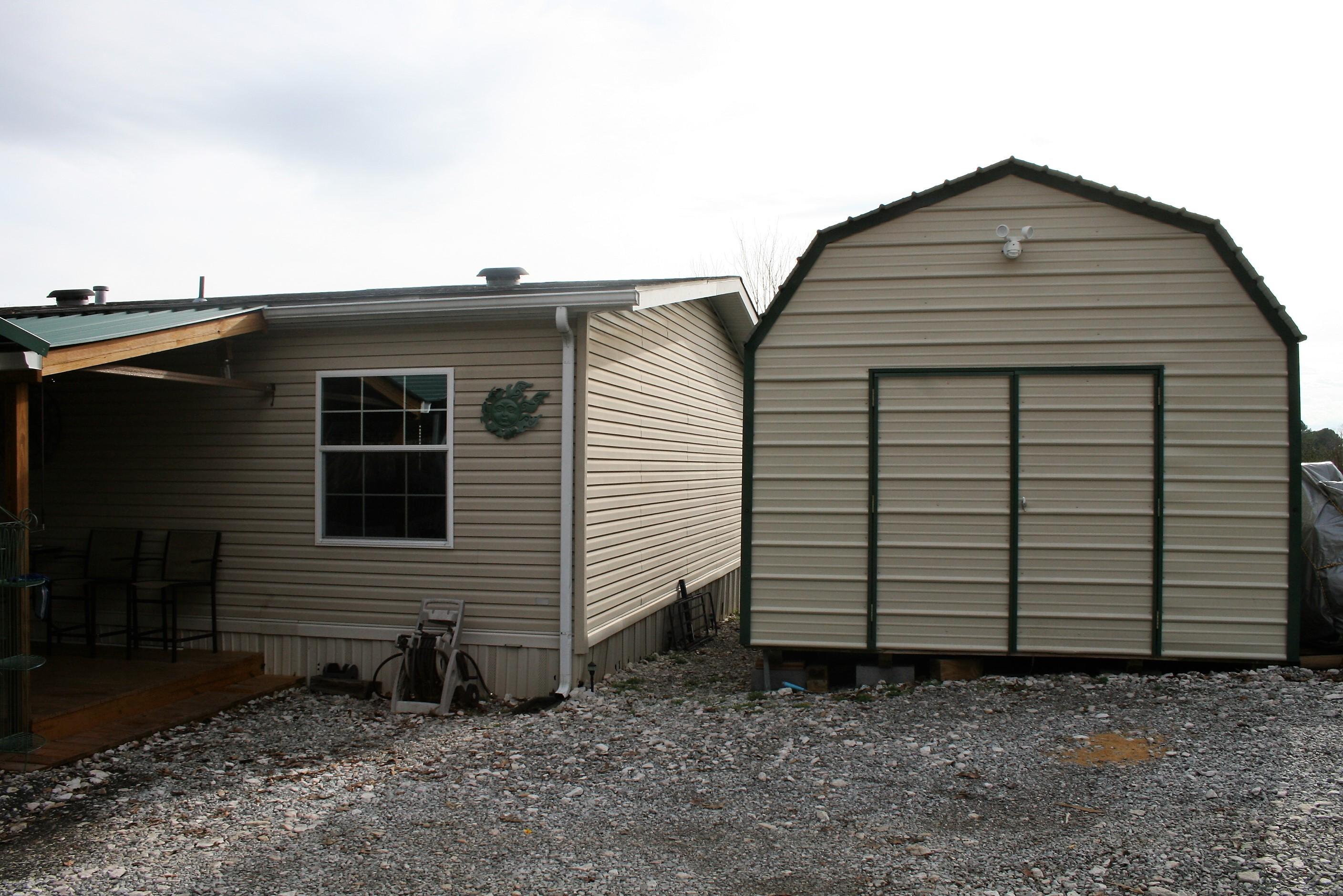 8831 Trout Road Mascot, TN 37806 - Photo 3 of 32 Shed and side house