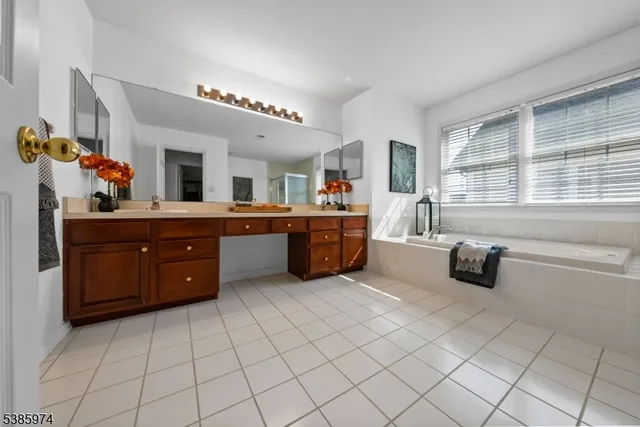 a kitchen with stainless steel appliances a sink and cabinets