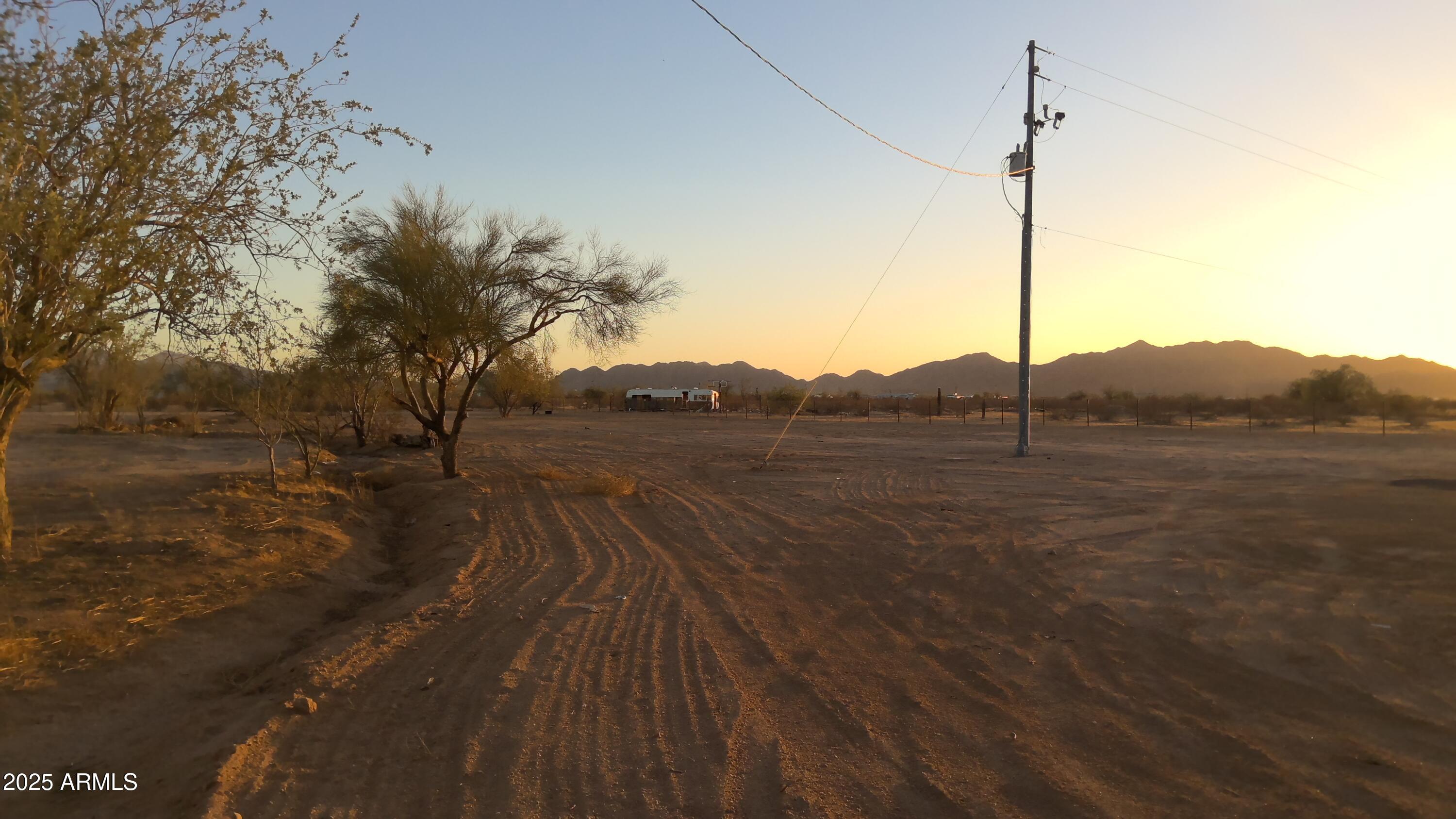 51603 West Pony Road Maricopa, AZ 85139 - Photo 11 of 36 a view of an outdoor space and a lake view