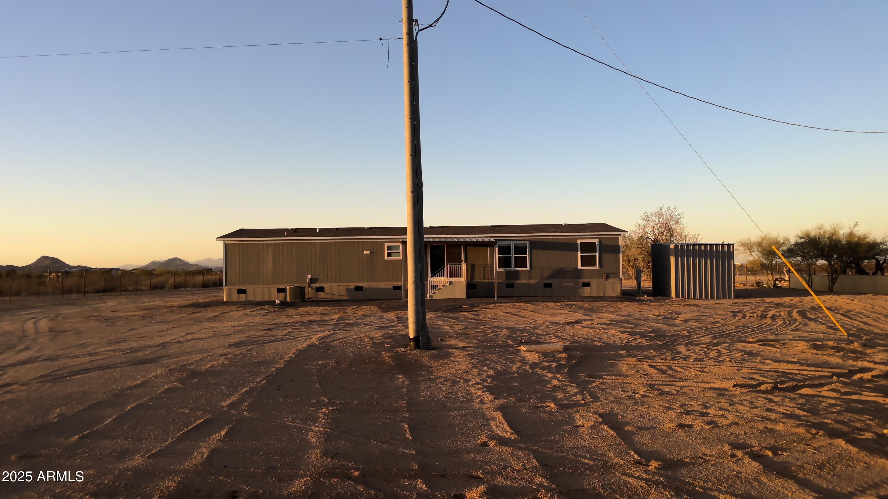 51603 West Pony Road Maricopa, AZ 85139 - Photo 6 of 36 a city view with tall buildings