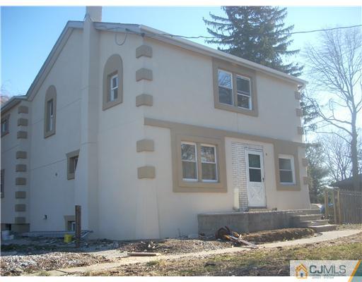 1776 Cheesequake Road Old Bridge, NJ 08857 - Photo 1 of 11 a front view of a house with a yard