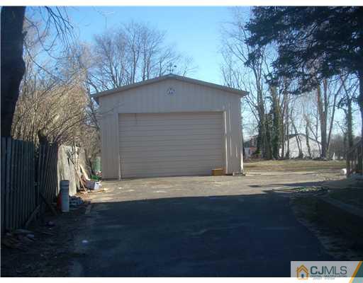 1776 Cheesequake Road Old Bridge, NJ 08857 - Photo 4 of 11 a front view of a house with a yard