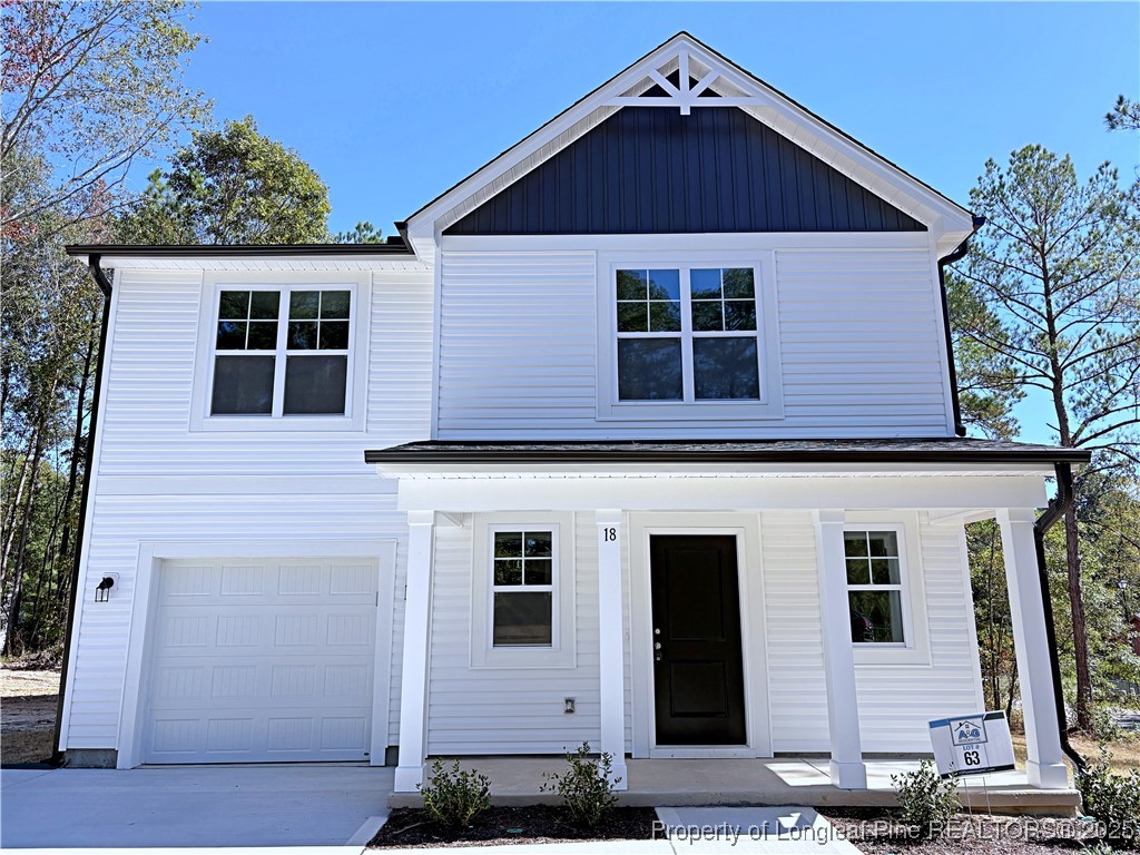 18 Morgan Court Spring Lake, NC 28390 - Photo 2 of 16 a front view of a house with a yard
