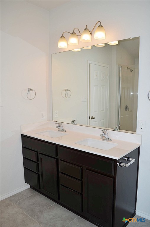 2606 Cortona Street Harker Heights, TX 76548 - Photo 21 of 40 a bathroom with a sink and a mirror
