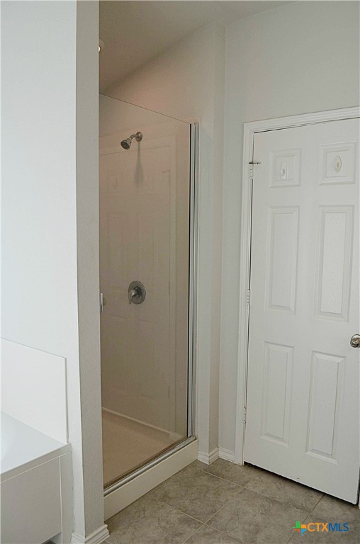 2606 Cortona Street Harker Heights, TX 76548 - Photo 22 of 40 a bathroom with a glass shower door