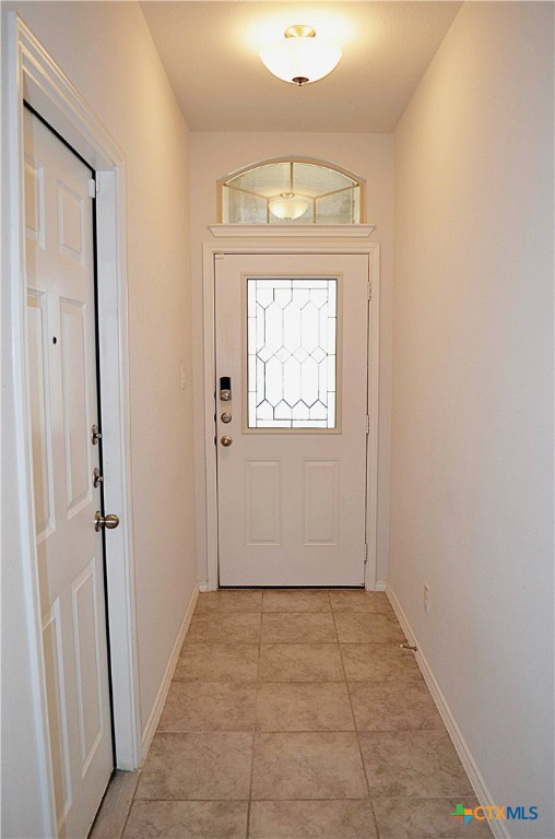 2606 Cortona Street Harker Heights, TX 76548 - Photo 4 of 40 an empty room with wooden floor cabinet and a window