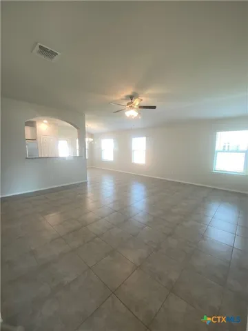 a view of an empty room and window