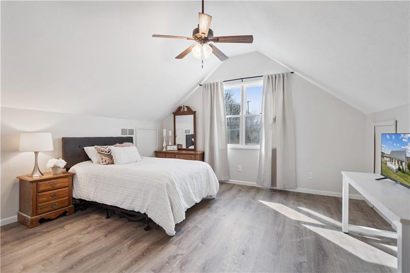 163 Upper Service Road Hookstown, PA 15050 - Photo 24 of 41 a bedroom with a bed and a ceiling fan
