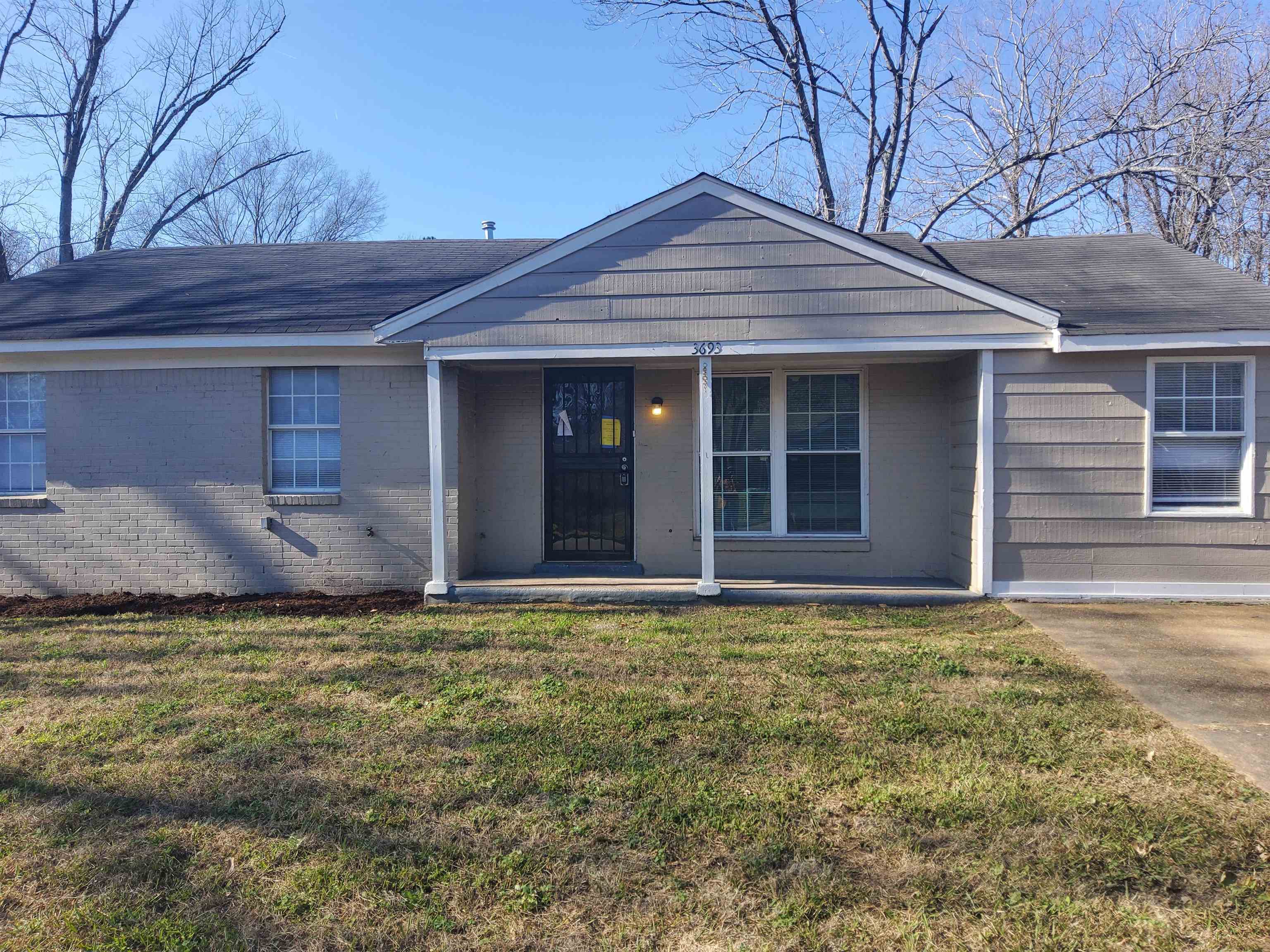a view of a house with a garden