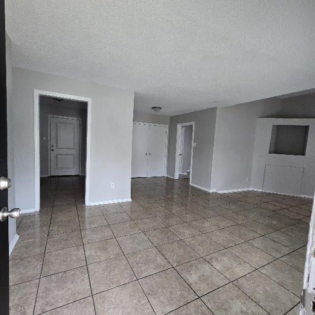 3693 Windermere Road Memphis, TN 38128 - Photo 4 of 10 a view of a livingroom with an empty space and a fireplace