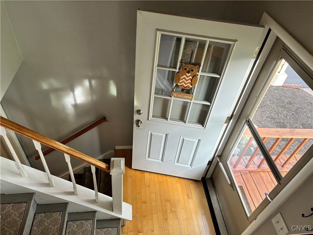 4243 Mill Run Road Liverpool, NY 13090 - Photo 2 of 26 View of the stairs and front door from the living