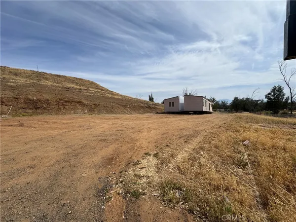 a view of yard with ocean view