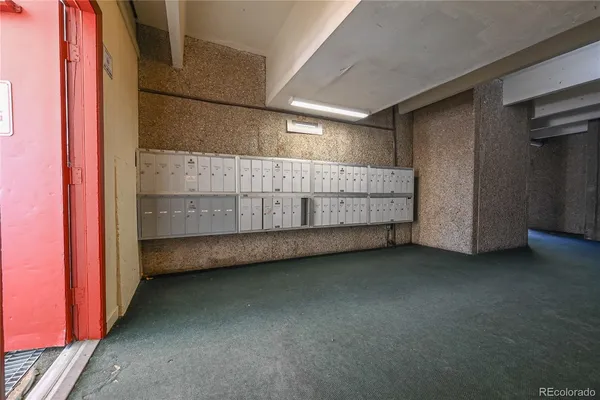 a view of a room with racks on the wall