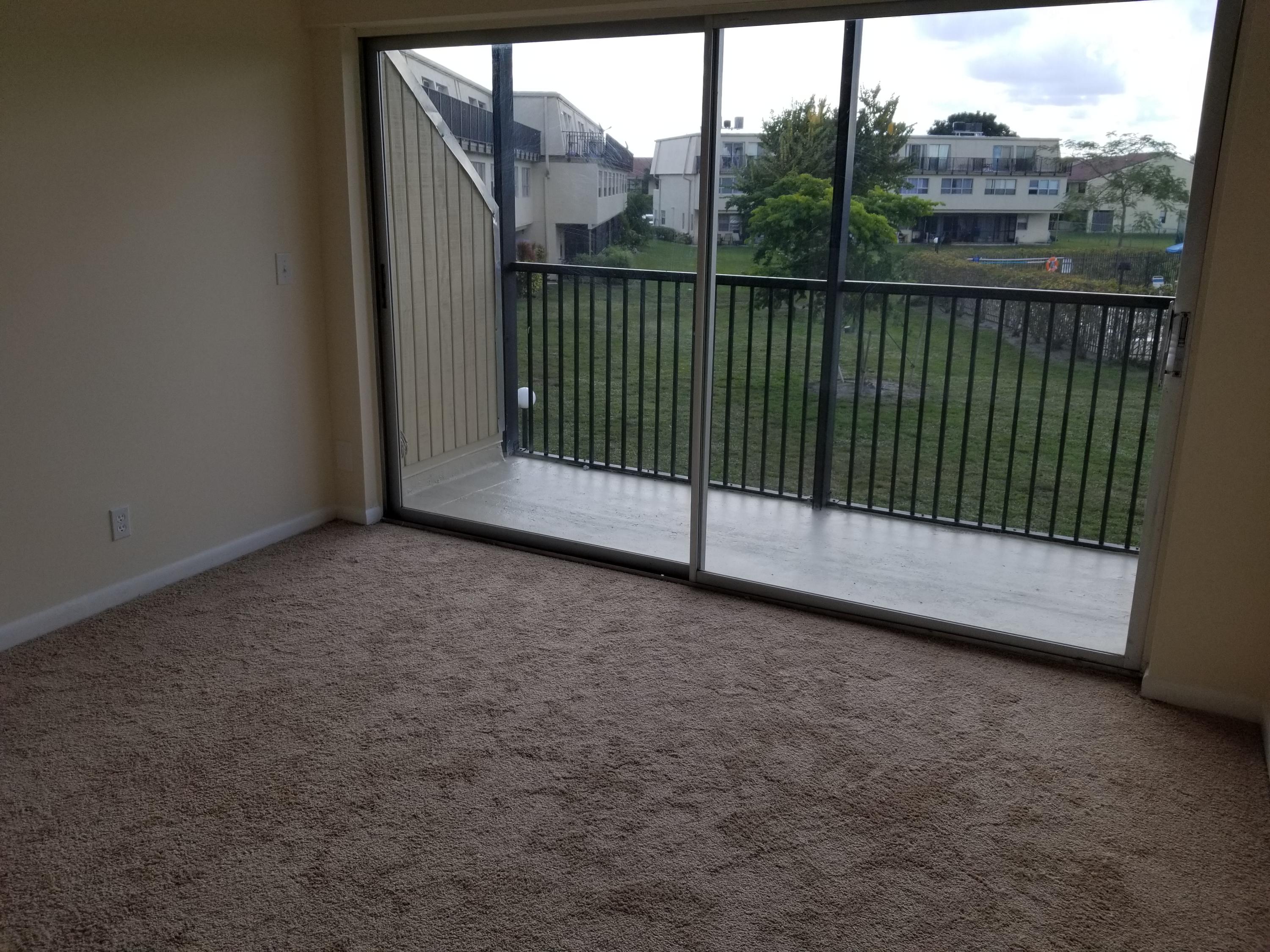 9500 Southwest 3rd Street, Unit A221 Boca Raton, FL 33428 - Photo 23 of 34 Family Room 2