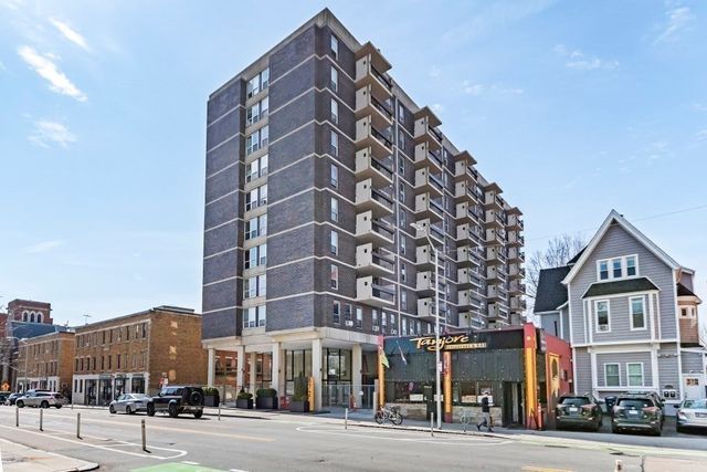 a view of a building and a street