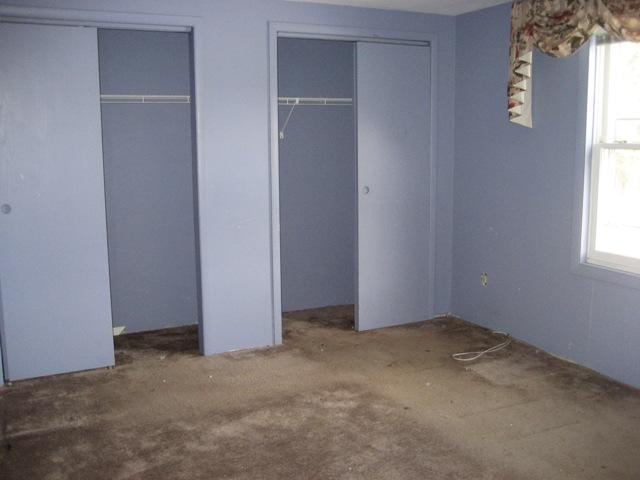 513 Polikoff Road Sheffield, MA 01222 - Photo 5 of 9 an empty room with windows