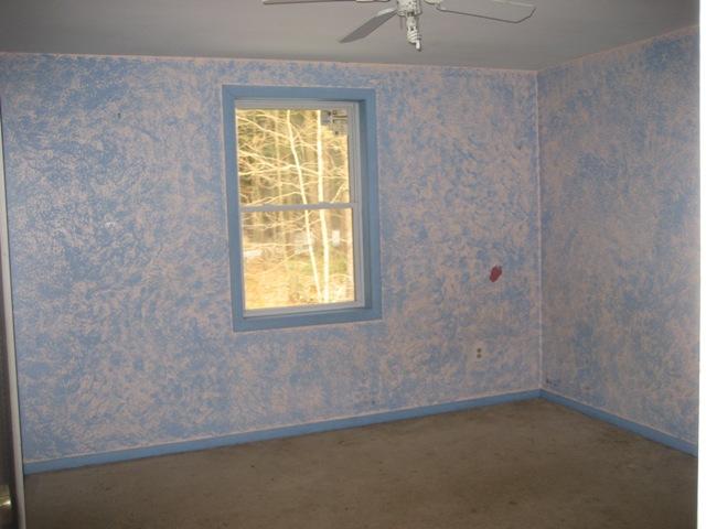 513 Polikoff Road Sheffield, MA 01222 - Photo 7 of 9 an empty room with a window