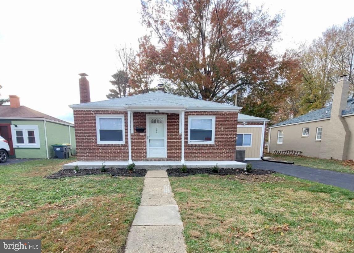 208 Harding Avenue Wilmington, DE 19804 - Photo 1 of 28 a front view of a house with a yard